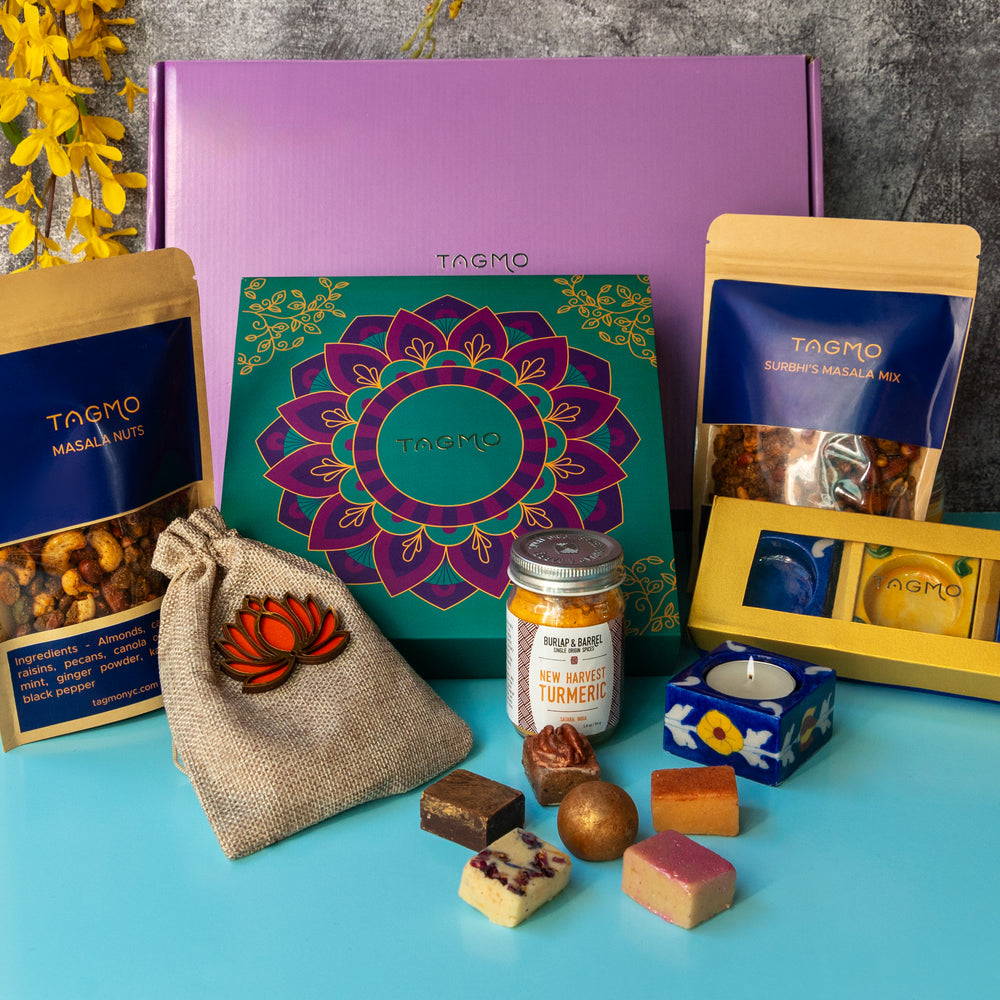 
                      
                        Vibrant Diwali Delight: A festive Indian mithai gift box showcasing a variety of traditional treats, from handcrafted diyas to flavorful kaju katli and masala nuts, capturing the essence of the Diwali celebration.
                      
                    